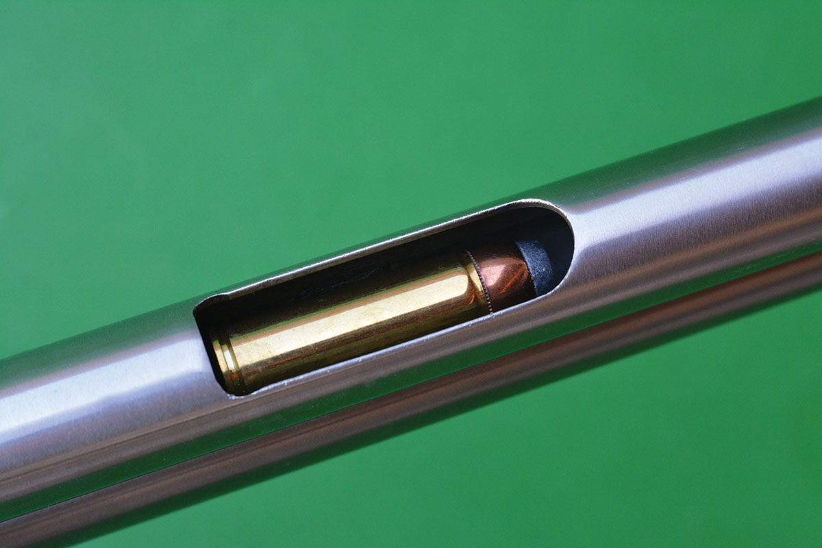 The inner magazine tube is a screw-in style that allows the rifle to be loaded similarly to tubular magazines found on rimfire rifles.